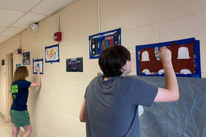  students painting in the hall at NPHS